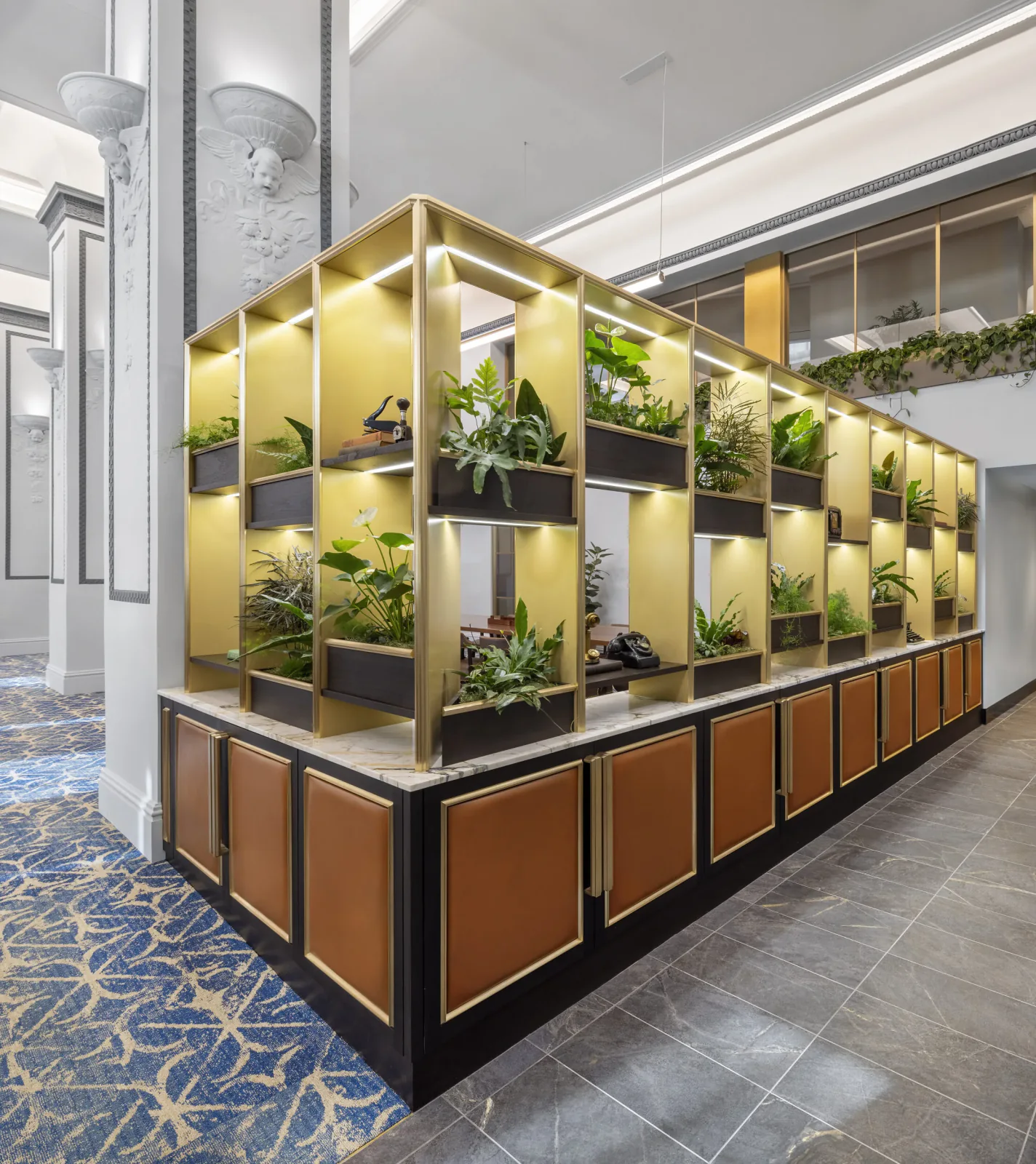 Plant wall integrated into the historic architecture of the investment firm's interior
